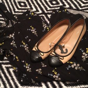 New black and cream flats